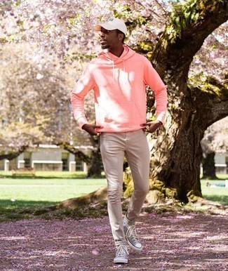 White and Black Print Baseball Cap Outfits For Men: Consider teaming a pink hoodie with a white and black print baseball cap to assemble a bold casual and stylish look. And if you wish to easily elevate your ensemble with a pair of shoes, why not throw grey canvas high top sneakers into the mix?