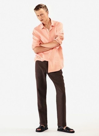 Leather Sandals Outfits For Men: For an off-duty outfit, try pairing a pink long sleeve shirt with dark brown chinos — these two items go beautifully together. Feeling inventive today? Spice things up by finishing off with a pair of leather sandals.
