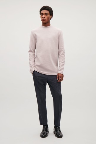 Pink Long Sleeve T-Shirt Outfits For Men: To pull together a casual outfit with a modern spin, consider wearing a pink long sleeve t-shirt and charcoal chinos. If you want to feel a bit fancier now, add black leather derby shoes to your outfit.