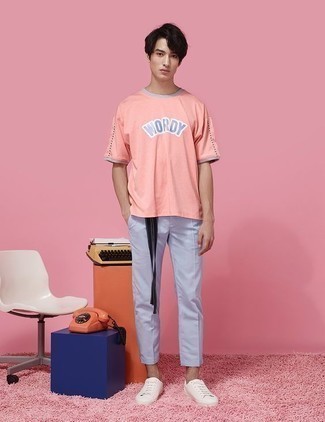 Aquamarine Chinos Outfits: If you want to feel confident in your outfit, consider wearing a pink print crew-neck t-shirt and aquamarine chinos. White leather low top sneakers are a never-failing footwear option here that's full of personality.