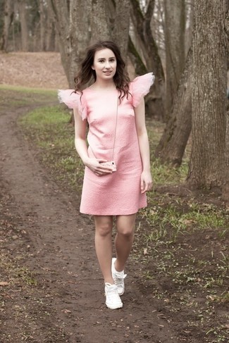 Pink Shift Dress Outfits: If the occasion calls for a sophisticated yet neat outfit, go for a pink shift dress. Put a more casual spin on your outfit by finishing with white canvas low top sneakers.