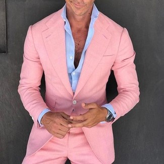 Hot Pink Suit Outfits: Pairing a hot pink suit with a light blue dress shirt is an amazing option for a sharp and classy look.