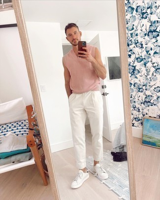 Pink Sweater Vest Outfits For Men: If the setting calls for an elegant yet killer menswear style, dress in a pink sweater vest and white chinos. Put a more relaxed spin on this ensemble with a pair of white leather low top sneakers.