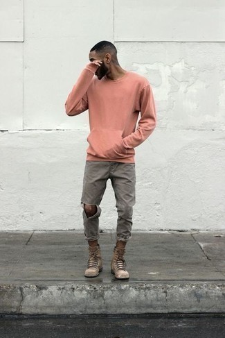 Grey Jeans Outfits For Men: You'll be surprised at how very easy it is for any gent to put together a contemporary ensemble like this. Just a pink sweatshirt and grey jeans. And if you need to instantly bump up this look with shoes, complete your ensemble with a pair of tan suede casual boots.