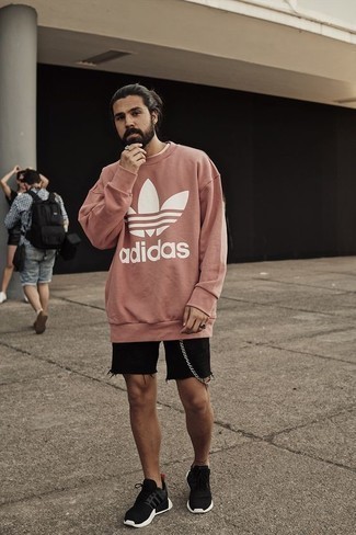 Pink Sweatshirt Outfits For Men: Such items as a pink sweatshirt and black denim shorts are the ideal way to inject some cool into your current casual rotation. Complement this look with black and white athletic shoes to instantly amp up the wow factor of this look.