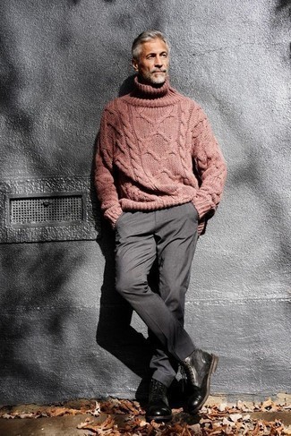 Pink Wool Turtleneck Outfits For Men: Try teaming a pink wool turtleneck with grey dress pants for masculine elegance with a contemporary spin. A pair of black leather casual boots immediately ups the street cred of this look.