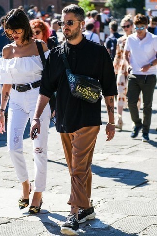 Brown Chinos Hot Weather Outfits: If you're in search of an off-duty but also seriously stylish outfit, marry a black polo with brown chinos. And it's amazing how black and white athletic shoes can change up a look.