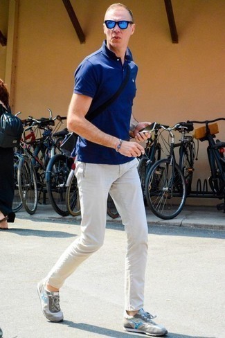 Blue Sunglasses Outfits For Men: Opt for a navy polo and blue sunglasses if you seek to look casually stylish without making too much effort. Feeling brave? Spice things up by slipping into a pair of grey athletic shoes.