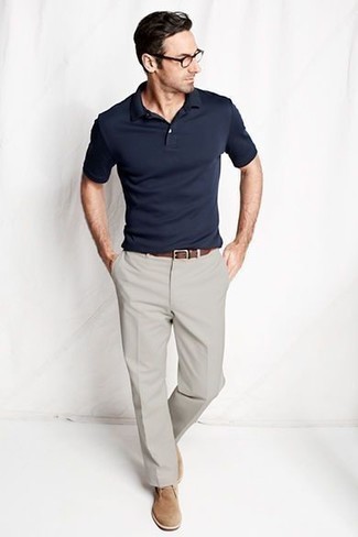 Tan Suede Desert Boots Outfits: A navy polo and grey chinos will inject your current fashion mix this relaxed and dapper vibe. Complete your ensemble with tan suede desert boots to completely change up the look.