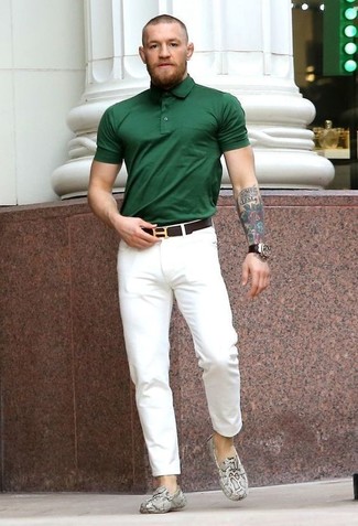 Dark Green Polo Outfits For Men: Why not pair a dark green polo with white chinos? These pieces are very practical and will look good paired together. Let your sartorial savvy truly shine by rounding off your look with grey snake leather driving shoes.