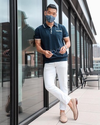 Beige Suede Loafers Outfits For Men: Go for a pared down but casually dapper option by marrying a navy polo and white chinos. Got bored with this getup? Introduce a pair of beige suede loafers to jazz things up.