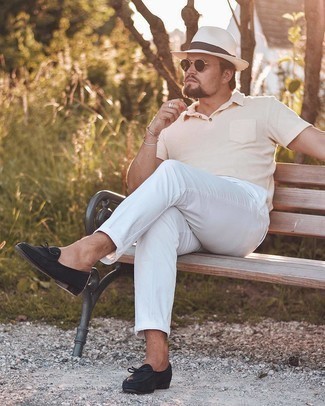 Pink Polo Outfits For Men: If you're in search of a laid-back and at the same time seriously stylish ensemble, go for a pink polo and white chinos. Infuse your outfit with a dose of refinement by slipping into a pair of black suede loafers.