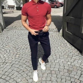 Black Sunglasses Hot Weather Outfits For Men: Pair a red polo with black sunglasses to achieve an interesting and street style ensemble. To give your overall getup a more polished twist, add a pair of white leather low top sneakers to the mix.