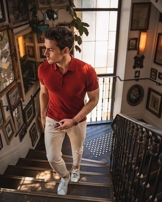 Red Polo Outfits For Men: If you like relaxed dressing, wear a red polo and beige chinos. Introduce white leather low top sneakers to the equation and ta-da: your ensemble is complete.