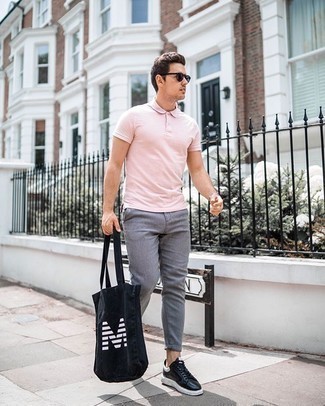 Black and White Print Canvas Tote Bag Outfits For Men: This combo of a pink polo and a black and white print canvas tote bag is a safe go-to for an utterly cool look. You could perhaps get a bit experimental when it comes to shoes and complete this look with black and white leather low top sneakers.