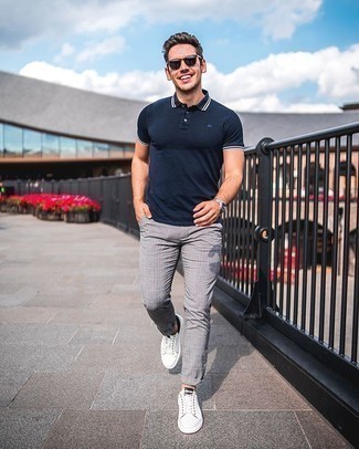 Navy Sunglasses Outfits For Men: If it's ease and functionality that you're looking for in an ensemble, consider wearing a navy polo and navy sunglasses. Bump up this whole ensemble by slipping into white and black canvas low top sneakers.