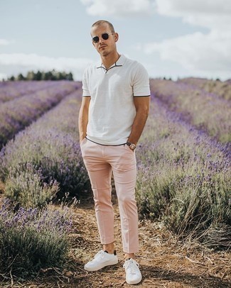 Hot Pink Chinos Outfits: A white polo and hot pink chinos? It's an easy-to-achieve outfit that anyone could rock a version of on a day-to-day basis. Complete this look with a pair of white and black canvas low top sneakers to tie your full outfit together.