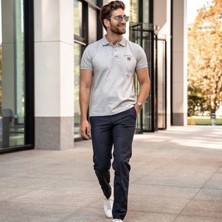 Navy Check Chinos Outfits: A grey polo and navy check chinos are a nice pairing to keep in your day-to-day wardrobe. White canvas low top sneakers are a safe footwear option that's full of personality.