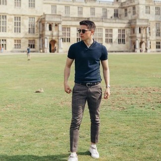 Brown Plaid Chinos Outfits: This casual combo of a navy polo and brown plaid chinos is a life saver when you need to look nice but have zero time to craft an ensemble. Now all you need is a pair of white canvas low top sneakers to finish off this ensemble.