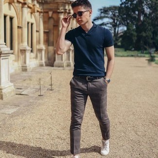 Brown Chinos Summer Outfits: For a casually cool outfit, try pairing a navy polo with brown chinos — these pieces go brilliantly together. A pair of white canvas low top sneakers is a goofproof footwear style here that's full of personality. This outfit is a safe option if you're looking for a great, summer-appropriate outfit.