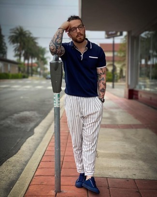 Men's Navy Polo, White Vertical Striped Chinos, Navy Canvas Low Top Sneakers, Clear Sunglasses