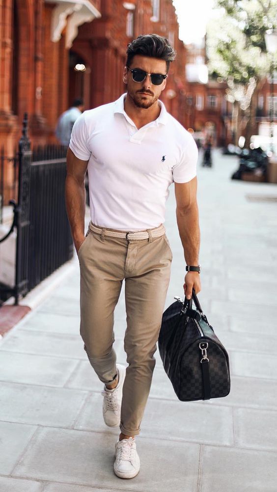 Men's White Polo, Chinos, White Low Black Leather Holdall | Lookastic