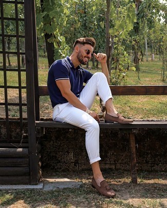 Tobacco Suede Tassel Loafers Outfits: If you're looking for a laid-back and at the same time dapper look, opt for a navy polo and white chinos. To bring a bit of fanciness to your getup, add tobacco suede tassel loafers to the equation.