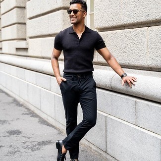 Black Polo Outfits For Men: This casual combination of a black polo and black chinos is super easy to throw together without a second thought, helping you look awesome and prepared for anything without spending a ton of time digging through your wardrobe. Let your styling skills truly shine by complementing your look with a pair of black leather tassel loafers.
