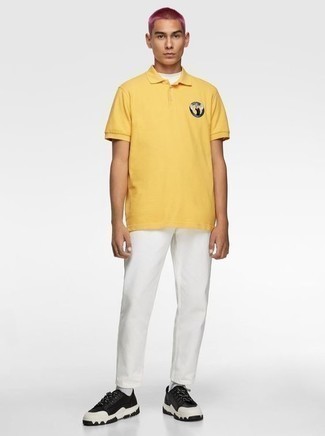 Mustard Print Polo Outfits For Men: This combination of a mustard print polo and white jeans spells laid-back attitude and casual menswear style. Add black and white canvas low top sneakers to the mix to pull the whole thing together.