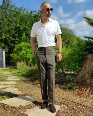 White and Black T-shirt with Polo Outfits For Men: For relaxed elegance with a manly twist, consider pairing a white and black t-shirt with grey dress pants. You can get a little creative in the footwear department and complete this getup with a pair of dark brown suede loafers.