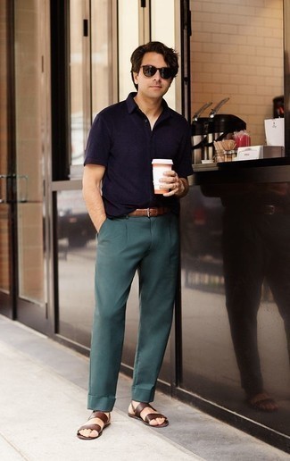 Brown Leather Sandals Outfits For Men: For an ensemble that's street-style-worthy and casually neat, pair a navy polo with teal dress pants. Brown leather sandals add a new depth to this ensemble.