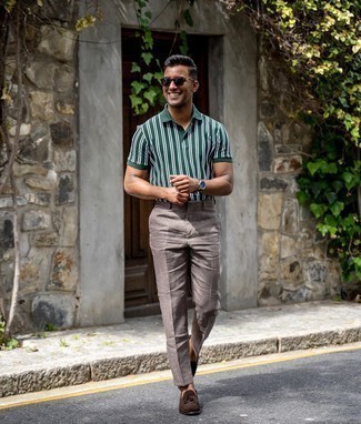 Brown Linen Dress Pants Outfits For Men: Breathe a hint of laid-back sophistication into your current routine with a dark green vertical striped polo and brown linen dress pants. Dark brown suede tassel loafers will bring a sense of refinement to an otherwise mostly casual outfit.