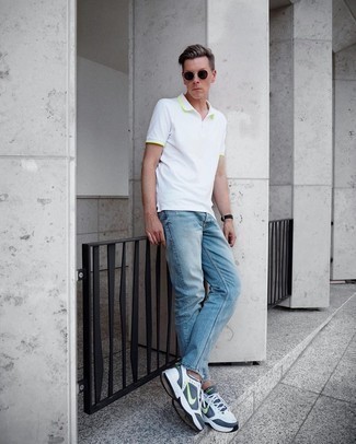 White and Black Athletic Shoes Outfits For Men: This pairing of a white polo and light blue jeans delivers comfort and practicality and helps keep it low-key yet modern. Dial up this look by wearing white and black athletic shoes.