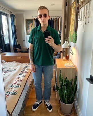 Men's Dark Green Polo, Blue Jeans, Navy and White Canvas Low Top Sneakers, Dark Brown Sunglasses