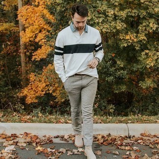 Polo Neck Sweater Smart Casual Outfits For Men: Make a polo neck sweater and grey chinos your outfit choice to put together a casually smart and well-executed outfit. Add beige suede chelsea boots to the equation to instantly shake up the look.