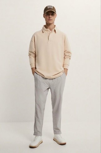 Men's Beige Polo Neck Sweater, Grey Seersucker Chinos, White Leather Low Top Sneakers, Brown Print Baseball Cap