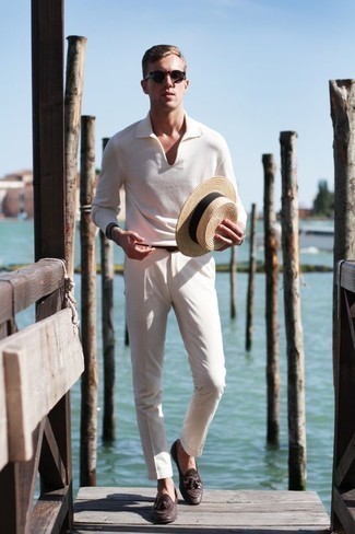 Beige Straw Hat Outfits For Men: This city casual combination of a white polo neck sweater and a beige straw hat can go in different directions according to how you style it. Dial up your look by rounding off with a pair of dark brown leather tassel loafers.