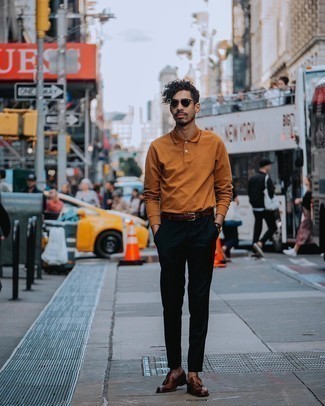 Black Chinos Outfits: A tobacco polo neck sweater and black chinos are among the crucial pieces in any guy's classic and casual wardrobe. You can get a little creative with shoes and introduce a pair of dark brown leather tassel loafers to the equation.