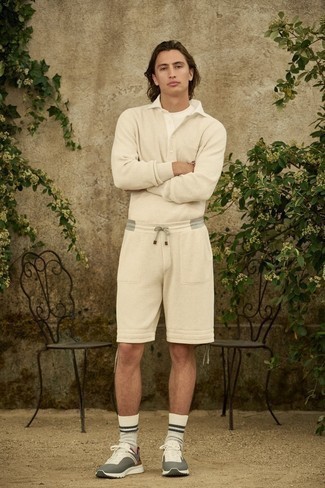 Beige Shorts Outfits For Men: For a casually classic look, opt for a beige polo neck sweater and beige shorts — these two pieces play well together. Add a modern twist to this outfit by slipping into a pair of charcoal athletic shoes.