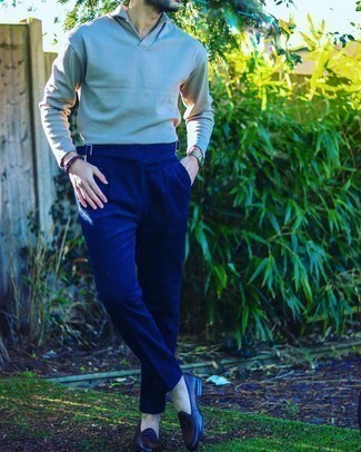 Grey Polo Neck Sweater Outfits For Men: This ensemble demonstrates it is totally worth investing in such timeless menswear pieces as a grey polo neck sweater and navy dress pants. If you need to immediately dress down your outfit with footwear, add a pair of navy leather loafers to the mix.