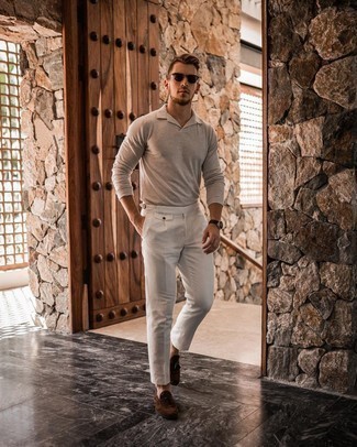 Beige Polo Neck Sweater Outfits For Men: Try pairing a beige polo neck sweater with white dress pants for extra classic style. All you need now is a cool pair of dark brown suede tassel loafers to complete your ensemble.