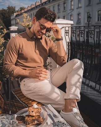 Beige Polo Neck Sweater Outfits For Men: Pairing a beige polo neck sweater with white jeans is an on-point choice for a casually stylish look. Grab a pair of white leather low top sneakers to make the outfit less formal.
