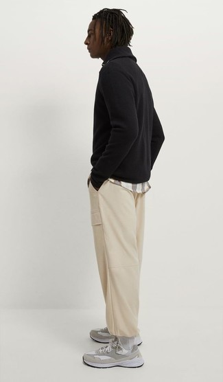 Men's Black Polo Neck Sweater, White Plaid Short Sleeve Shirt, Beige Cargo Pants, Grey Athletic Shoes