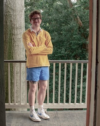 Aquamarine Shorts Outfits For Men: A yellow polo neck sweater and aquamarine shorts make for the perfect base for an outfit. Want to play it down when it comes to footwear? Throw a pair of white and blue leather high top sneakers in the mix for the day.