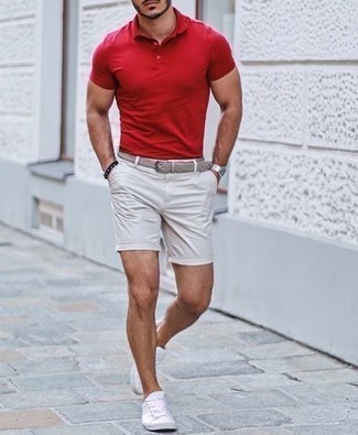 Red Polo Outfits For Men: Marry a red polo with white shorts to create a really dapper and current casual outfit. Complement this getup with white canvas low top sneakers et voila, this getup is complete.