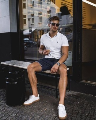 Charcoal Canvas Watch Outfits For Men: The combination of a white polo and a charcoal canvas watch makes for a solid off-duty look. Want to go all out in the shoe department? Introduce white canvas low top sneakers to your look.
