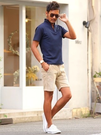 Men's Navy Polo, Beige Corduroy Shorts, White Canvas Low Top Sneakers, Dark Brown Sunglasses