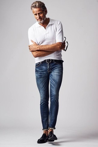 Navy Skinny Jeans Outfits For Men: This contemporary combination of a white polo and navy skinny jeans is very easy to throw together in next to no time, helping you look awesome and prepared for anything without spending too much time searching through your wardrobe. Give a different twist to an otherwise all-too-common outfit with black leather loafers.