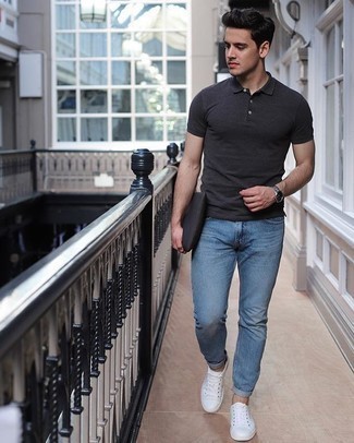 Charcoal Polo Outfits For Men: Combining a charcoal polo with light blue skinny jeans is a wonderful pick for a casual yet stylish look. To add some extra flair to this outfit, introduce a pair of white canvas low top sneakers to the mix.