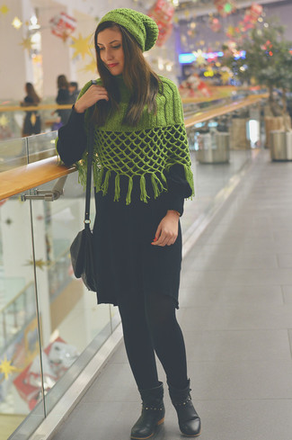 Black Sweater Dress Outfits: If you're on a mission for an off-duty yet totaly stylish look, marry a black sweater dress with a green knit poncho. Black leather ankle boots will add a different twist to this look.